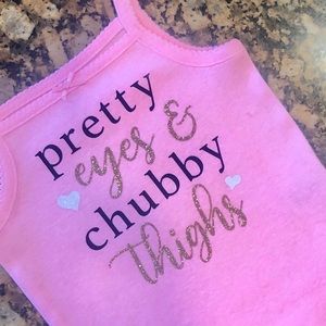 “Pretty eyes chubby thighs” onesie